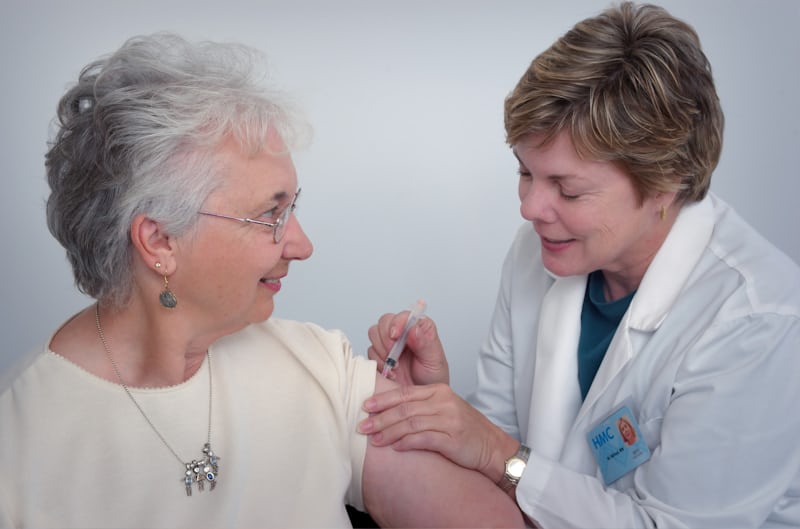 Carer assisting an older person