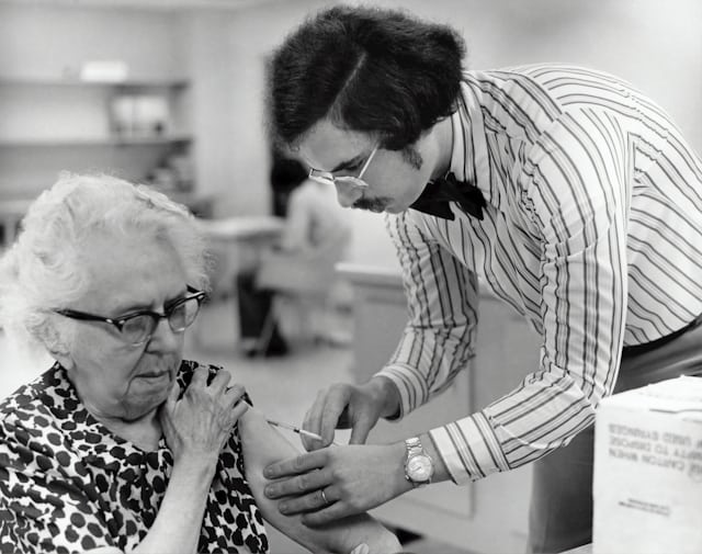 Older patient receiving a vaccine