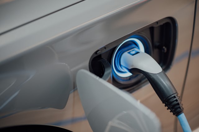 Electric vehicle being charged